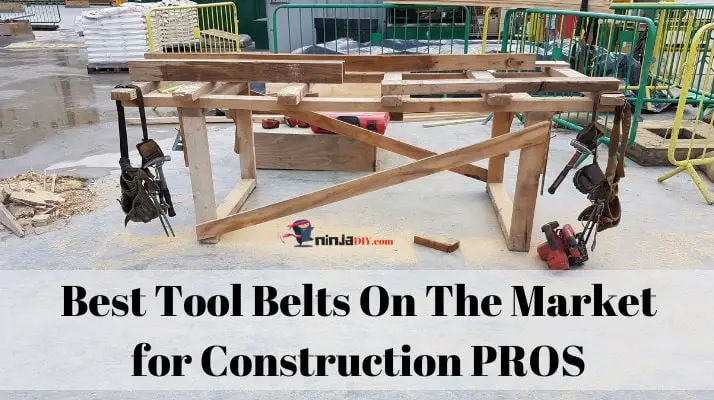 two of some of the best tool belts for construction professionals hanging on the corners of a carpenter's bench